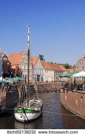 Ship in the old harbour and outdoor cafes, Stade, Lower Saxony, Germany, Europe View Large Photo Image Stock Image - Ship in the old harbour and outdoor cafes, Stade, Lower Saxony, Germany, Europe. Fotosearch