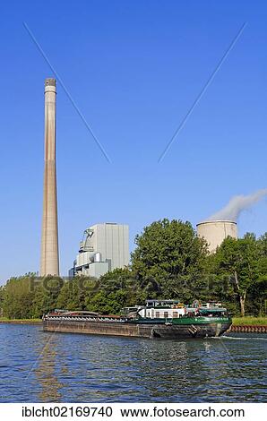 Ship on the Datteln-Hamm Canal and a coal-fired power station in Bergkamen-Heil, North-Rhine-Westphalia, Germany, Europe, PublicGround, Europe View Large Photo Image Stock Image - Ship on the Datteln-Hamm Canal and a coal-fired power station in Bergkamen-Heil, North-Rhine-Westphalia, Germany, Europe, PublicGround, Europe. Fotosearch