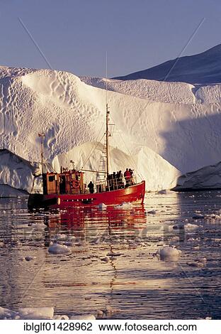 Stock Image - Shrimp boats in the Kangia Ice Fjord, Ilulissat, Jabobshavn, Greenland, North America. Fotosearch