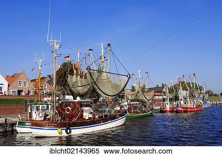 Shrimp cutters in the harbour, Greetsiel, East Frisia, Lower Saxony, Germany, Europe View Large Photo Image Stock Photography - Shrimp cutters in the harbour, Greetsiel, East Frisia, Lower Saxony, Germany, Europe. Fotosearch