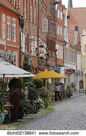 Sidewalk cafe of Cafe Krone, Lueneburg, Lower Saxony, Germany, Europe View Large Photo Image Stock Image - Sidewalk cafe of Cafe Krone, Lueneburg, Lower Saxony, Germany, Europe. Fotosearch