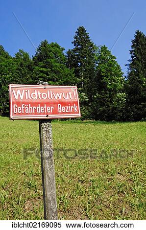 Stock Photography - Sign, Wildtollwut Gefaehrdeter Bezirk, German for Lyssavirus endangered district, Berchtesgaden, Bavaria, Germany, Europe, PublicGround, Europe. Fotosearch