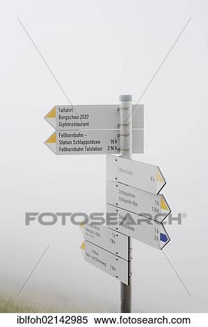 Stock Photography - Signpost in the fog on Fellhorn Mountain, Oberstdorf, Allgaeu, Bavaria, Germany, Europe, PublicGround, Europe. Fotosearch