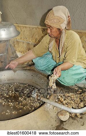 Silk production, Usbek woman cooking silkworm cocoons, Silk Road, Fergana Valley, Uzbekistan, Central Asia, Asia View Large Photo Image Stock Photo - Silk production, Usbek woman cooking silkworm cocoons, Silk Road, Fergana Valley, Uzbekistan, Central Asia, Asia. Fotosearch