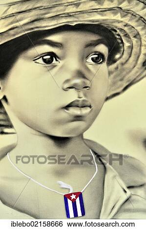 Stock Photograph - Small Cuban boy, painting, souvenirs, market stall, Trinidad, Cuba, Greater Antilles, Central America, America, North America. Fotosearch