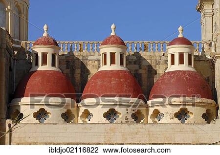 Stock Image - Small red cupolas of St. Lawrence church in Saint Lawrence, San Lawrenz, Gozo, Malta, Europe. Fotosearch