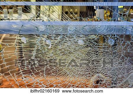 Smashed front window of a jewellery shop View Large Photo Image Stock Photo - Smashed front window of a jewellery shop. Fotosearch