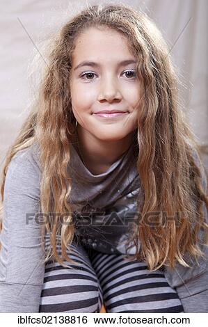Smiling girl, 10 - 12 years, portrait View Large Photo Image Stock Photograph - Smiling girl, 10 - 12 years, portrait. Fotosearch