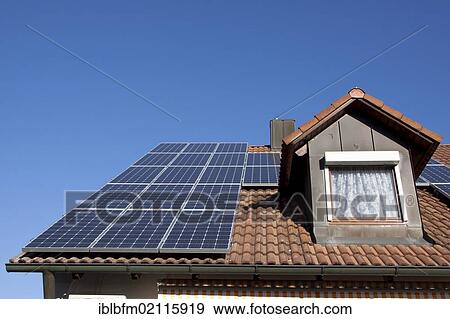 Solar panels on a house roof, photovoltaic View Large Photo Image Stock Photo - Solar panels on a house roof, photovoltaic. Fotosearch