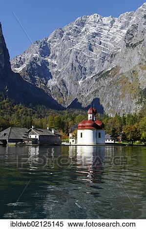 St. Bartholomae church below the Watzmann Ostwand rock face, Lake Koenigsee, Berchtesgadener Land country, Upper Bavaria, Germany, Europe View Large Photo Image Stock Photography - St. Bartholomae church below the Watzmann Ostwand rock face, Lake Koenigsee, Berchtesgadener Land country, Upper Bavaria, Germany, Europe. Fotosearch
