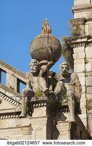 Stock Photo - Statue Os Meninos, The children, supporting the terrestrial globe, Church Da Graça, Evora, Unesco World Heritage Site, Alentejo, Portugal, Europe. Fotosearch