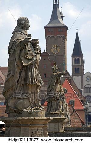 Statues on the Alte Mainbruecke, Old Main Bridge with the towers of downtown Wuerzburg at back, Lower Franconia, Bavaria, Germany, Europe View Large Photo Image Stock Photo - Statues on the Alte Mainbruecke, Old Main Bridge with the towers of downtown Wuerzburg at back, Lower Franconia, Bavaria, Germany, Europe. Fotosearch