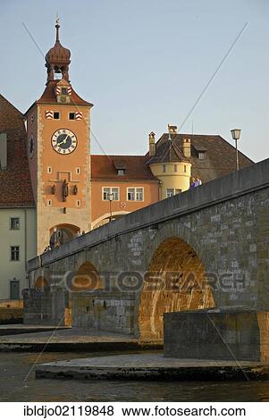 Steinerne Bruecke, Stone Bridge crossing the Danube river and the tower at the southern end of the bridge, Regensburg, Upper Palatinate, Bavaria, Germany, Europe View Large Photo Image Stock Photo - Steinerne Bruecke, Stone Bridge crossing the Danube river and the tower at the southern end of the bridge, Regensburg, Upper Palatinate, Bavaria, Germany, Europe. Fotosearch