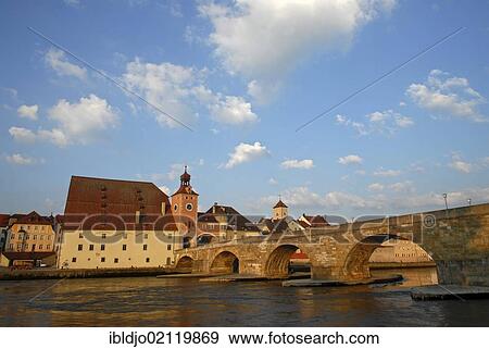 Steinerne Bruecke, Stone Bridge crossing the Danube river and the Salzstadel storehouse at the left, Regensburg, Upper Palatinate, Bavaria, Germany, Europe View Large Photo Image Stock Photo - Steinerne Bruecke, Stone Bridge crossing the Danube river and the Salzstadel storehouse at the left, Regensburg, Upper Palatinate, Bavaria, Germany, Europe. Fotosearch