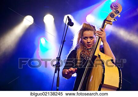 Stella Bondesson, one of the sisters from the Swedish siblings band Baskery, performing live in the Schueuer concert hall, Lucerne, Switzerland, Europe View Large Photo Image Stock Photography - Stella Bondesson, one of the sisters from the Swedish siblings band Baskery, performing live in the Schueuer concert hall, Lucerne, Switzerland, Europe. Fotosearch