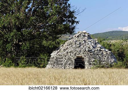 Stone hut in a cornfield, Vaucluse, Provence-Alpes-Cote d'Azur, Southern France, France, Europe, PublicGround, Europe View Large Photo Image Stock Photo - Stone hut in a cornfield, Vaucluse, Provence-Alpes-Cote d'Azur, Southern France, France, Europe, PublicGround, Europe. Fotosearch