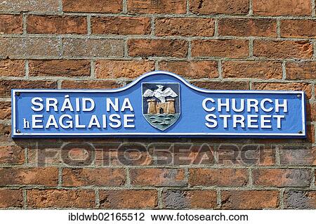 Street sign, bilingual, English, Gaelic, Church Street, Enniscorthy, County Wexford, Ireland, Europe View Large Photo Image Stock Image - Street sign, bilingual, English, Gaelic, Church Street, Enniscorthy, County Wexford, Ireland, Europe. Fotosearch