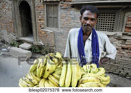 Street vendors selling bananas, Kathmandu, Nepal, Asia View Large Photo Image Stock Photo - Street vendors selling bananas, Kathmandu, Nepal, Asia. Fotosearch