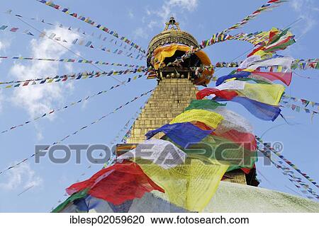 Stupa with fluttering prayer flags, Boudhanath, Kathmandu, Nepal, Asia View Large Photo Image Stock Image - Stupa with fluttering prayer flags, Boudhanath, Kathmandu, Nepal, Asia. Fotosearch