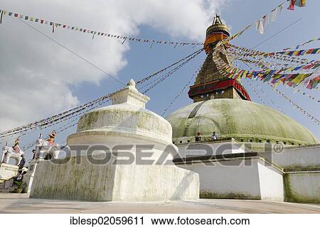 Stupa with prayer flags, eyes of Buddha, Boudhanath, Kathmandu, Nepal, Asia View Large Photo Image Stock Image - Stupa with prayer flags, eyes of Buddha, Boudhanath, Kathmandu, Nepal, Asia. Fotosearch