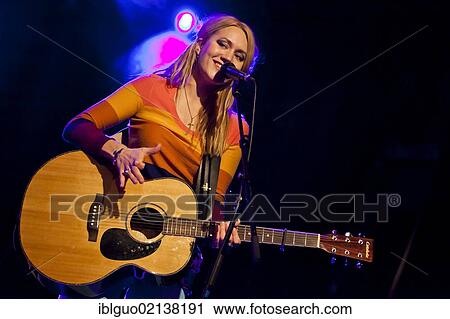 Sunniva Bondesson, one of the sisters from the Swedish siblings band Baskery, performing live in the Schueuer concert hall, Lucerne, Switzerland, Europe View Large Photo Image Stock Image - Sunniva Bondesson, one of the sisters from the Swedish siblings band Baskery, performing live in the Schueuer concert hall, Lucerne, Switzerland, Europe. Fotosearch