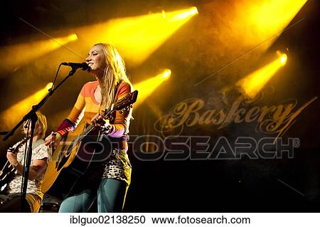 Sunniva Bondesson, one of the sisters from the Swedish siblings band Baskery, performing live in the Schueuer concert hall, Lucerne, Switzerland, Europe View Large Photo Image Stock Image - Sunniva Bondesson, one of the sisters from the Swedish siblings band Baskery, performing live in the Schueuer concert hall, Lucerne, Switzerland, Europe. Fotosearch