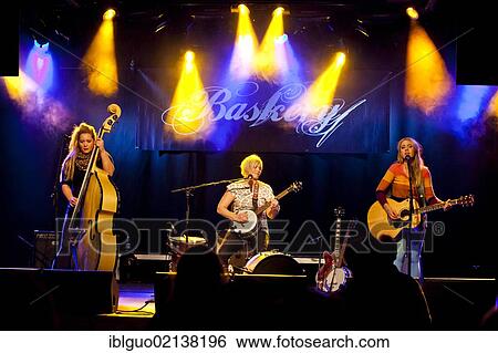 Stock Photograph - Swedish siblings band Baskery performing live in the Schueuer concert hall, Lucerne, Switzerland, Europe. Fotosearch