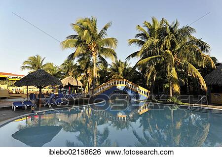 Stock Photograph - Swimming pool, 4-star Brisas Trinidad Del Mar Hotel, Trinidad, Cuba, Greater Antilles, Caribbean, Central America, America, North America. Fotosearch