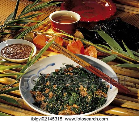 Stock Photography - Swiss chard with sesame sauce, hot starter, Japan, Asia. Fotosearch