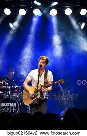 Swiss singer and songwriter Bastian Baker performing live in the Schueuer concert hall, Lucerne, Switzerland, Europe View Large Photo Image Stock Image - Swiss singer and songwriter Bastian Baker performing live in the Schueuer concert hall, Lucerne, Switzerland, Europe. Fotosearch