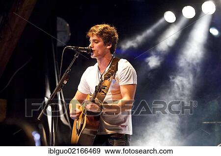 Swiss singer and songwriter Bastian Baker performing live in the Schueuer concert hall, Lucerne, Switzerland, Europe View Large Photo Image Stock Photo - Swiss singer and songwriter Bastian Baker performing live in the Schueuer concert hall, Lucerne, Switzerland, Europe. Fotosearch