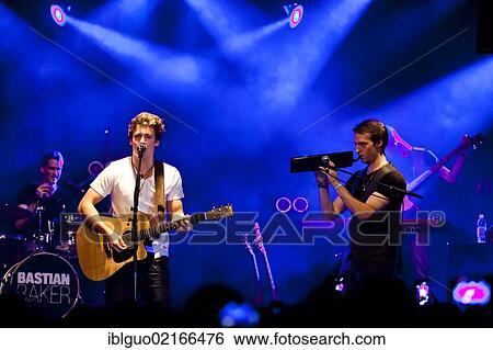 Swiss singer and songwriter Bastian Baker performing live in the Schueuer concert hall, Lucerne, Switzerland, Europe View Large Photo Image Stock Photograph - Swiss singer and songwriter Bastian Baker performing live in the Schueuer concert hall, Lucerne, Switzerland, Europe. Fotosearch