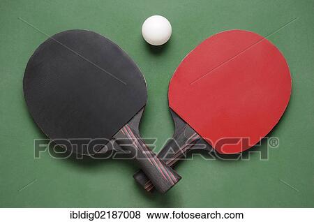 Stock Photo - Table-tennis bats and ball. Fotosearch