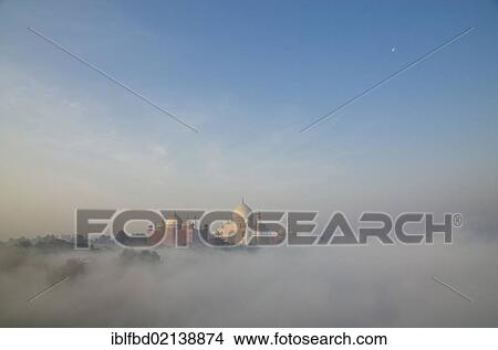 Taj Mahal, UNESCO World Heritage Site, arising out of the morning fog over river Yamuna, Agra, Uttar Pradesh, India, Asia View Large Photo Image Picture - Taj Mahal, UNESCO World Heritage Site, arising out of the morning fog over river Yamuna, Agra, Uttar Pradesh, India, Asia. Fotosearch