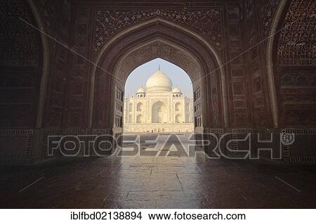 Taj Mahal, UNESCO World Heritage Site, seen through one of the huge gates of the surrounding buildings, Agra, Uttar Pradesh, India, Asia View Large Photo Image Picture - Taj Mahal, UNESCO World Heritage Site, seen through one of the huge gates of the surrounding buildings, Agra, Uttar Pradesh, India, Asia. Fotosearch