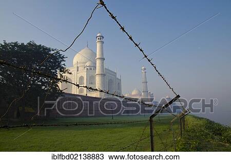 Taj Mahal, UNESCO World Heritage Site, fenced with barbed wire for security reasons, Agra, Uttar Pradesh, India, Asia View Large Photo Image Stock Image - Taj Mahal, UNESCO World Heritage Site, fenced with barbed wire for security reasons, Agra, Uttar Pradesh, India, Asia. Fotosearch