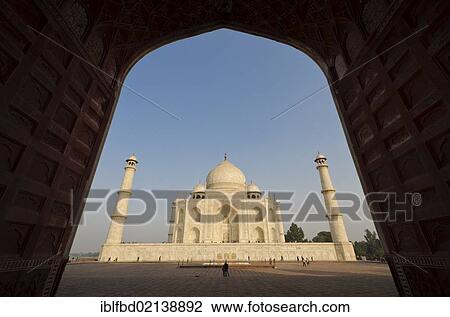 Taj Mahal, UNESCO World Heritage Site, seen through one of the huge gates of the surrounding buildings, Agra, Uttar Pradesh, India, Asia View Large Photo Image Stock Image - Taj Mahal, UNESCO World Heritage Site, seen through one of the huge gates of the surrounding buildings, Agra, Uttar Pradesh, India, Asia. Fotosearch