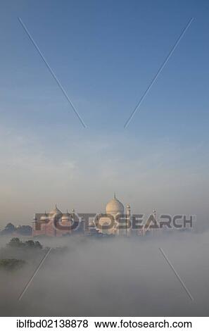 Taj Mahal, UNESCO World Heritage Site, arising out of the morning fog over river Yamuna, Agra, Uttar Pradesh, India, Asia View Large Photo Image Stock Photo - Taj Mahal, UNESCO World Heritage Site, arising out of the morning fog over river Yamuna, Agra, Uttar Pradesh, India, Asia. Fotosearch