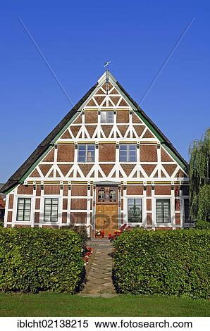 Stock Photography - Thatched farmhouse near Ladekop, Altes Land, Lower Saxony, Germany, Europe, Europe. Fotosearch