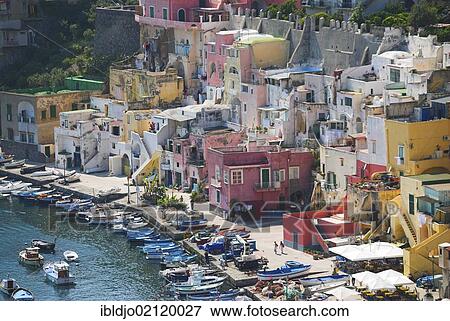 The colorful houses of the fishing harbour of Procida island, Flegrean Islands, Gulf of Naples, Campania, southern Italy, Europe View Large Photo Image Stock Photo - The colorful houses of the fishing harbour of Procida island, Flegrean Islands, Gulf of Naples, Campania, southern Italy, Europe. Fotosearch