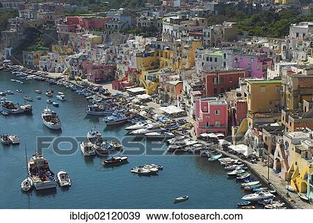 The colorful houses of the fishing harbour of Procida island, Flegrean Islands, Gulf of Naples, Campania, southern Italy, Europe View Large Photo Image Stock Photo - The colorful houses of the fishing harbour of Procida island, Flegrean Islands, Gulf of Naples, Campania, southern Italy, Europe. Fotosearch
