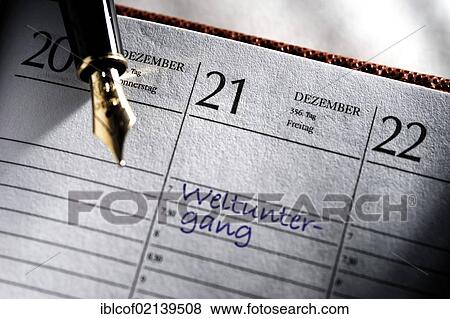 Stock Photo - The date 21. 12. 2012 in a calender, marked Weltuntergang, German for doomsday, symbolic image for the doomsday prophecy of 2012. Fotosearch