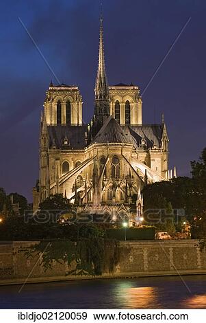The gothic catedral of Notre Dame de Paris on the Ile de la Cite and the river Seine at the blue hour, as seen from Pont de la Toumelle, Paris, Ile De France, France, Europe View Large Photo Image Stock Photo - The gothic catedral of Notre Dame de Paris on the Ile de la Cite and the river Seine at the blue hour, as seen from Pont de la Toumelle, Paris, Ile De France, France, Europe. Fotosearch