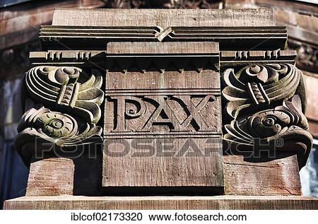 Stock Image - The Latin word "pax", peace, on the facade of a mausoleum in Ohlsdorf cemetery, Hamburg, Germany, Europe. Fotosearch