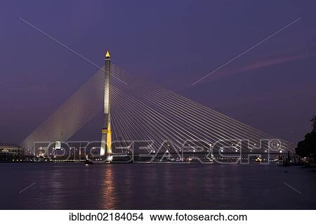Picture - The Rama VIII Bridge in Bangkok at night, Thailand, Asia. Fotosearch