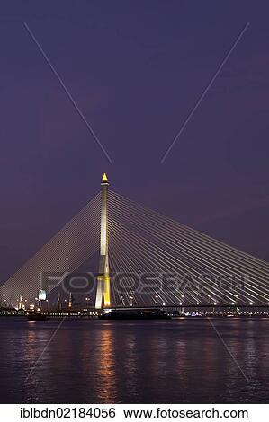 Stock Photograph - The Rama VIII Bridge in Bangkok at night, Thailand, Asia. Fotosearch