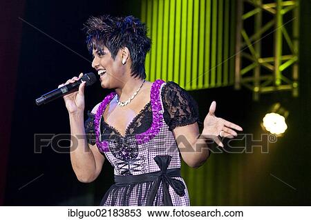 The Swiss pop and folk music singer Sarah-Jane performing live at the Schlager Nacht 2012, pop music event, in Lucerne, Switzerland, Europe View Large Photo Image Stock Image - The Swiss pop and folk music singer Sarah-Jane performing live at the Schlager Nacht 2012, pop music event, in Lucerne, Switzerland, Europe. Fotosearch