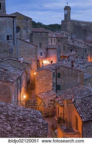 The tufa town of Sorano at the blue hour, Tuscany, Italy, Europe View Large Photo Image Stock Image - The tufa town of Sorano at the blue hour, Tuscany, Italy, Europe. Fotosearch