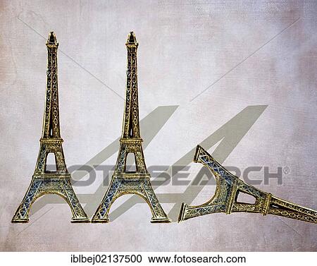 Three miniature Eiffel Towers shaped like the letter A, one toppled over, symbolic image for the French AAA credit rating downgrade View Large Photo Image Stock Image - Three miniature Eiffel Towers shaped like the letter A, one toppled over, symbolic image for the French AAA credit rating downgrade. Fotosearch