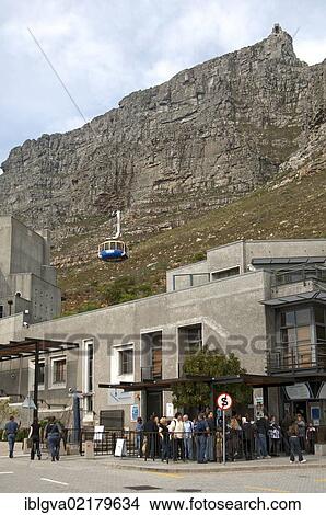 Tourists standing at the valley station of the Table Mountain cable car ticket office, Cape Town, South Africa, Africa View Large Photo Image Picture - Tourists standing at the valley station of the Table Mountain cable car ticket office, Cape Town, South Africa, Africa. Fotosearch